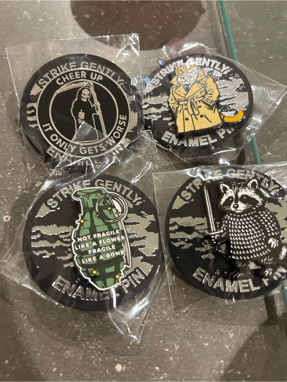 Four Enamel Pins